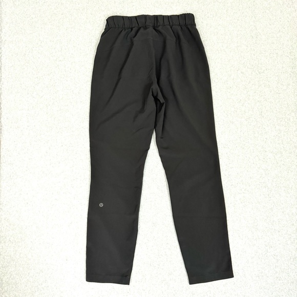 Lululemon On The Fly Pant Woven Womens 4 Black Travel Outdoor Casual W5AHOS READ - Picture 7 of 14